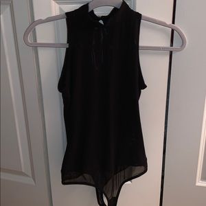 Bebe high neck stretchy body suit size xs